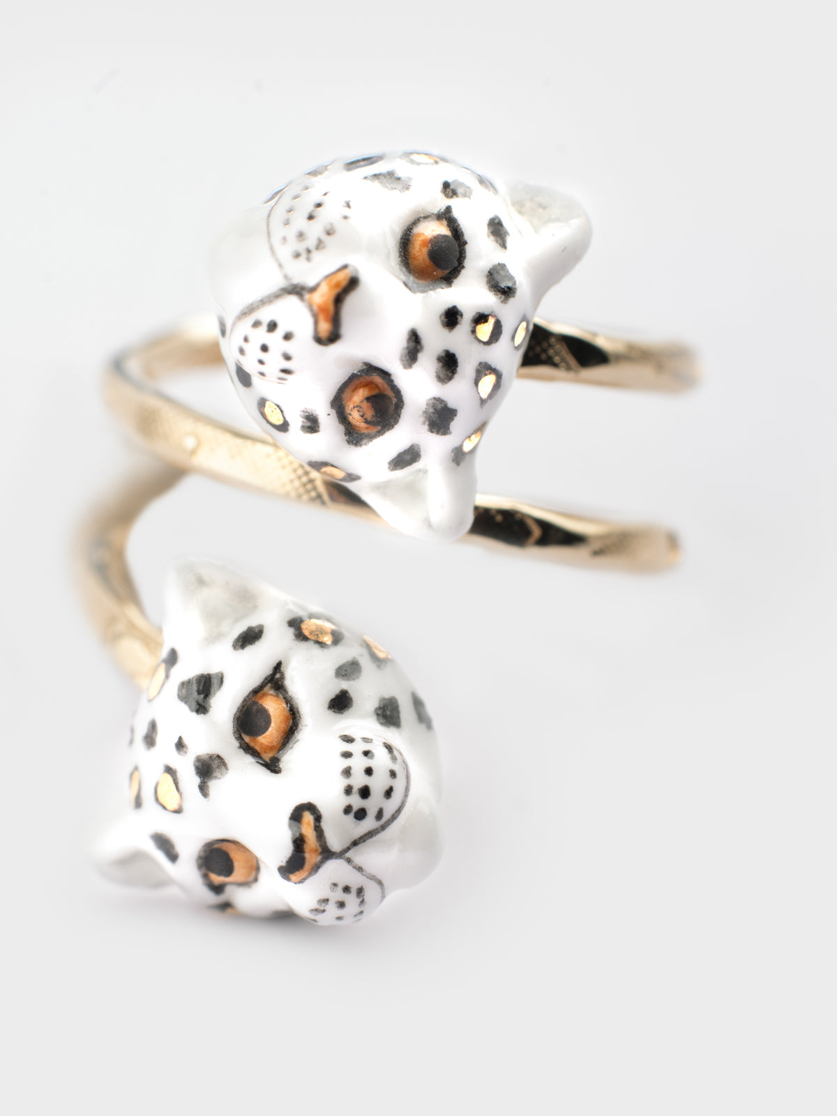 Bague spirale léopards blancs et dorés