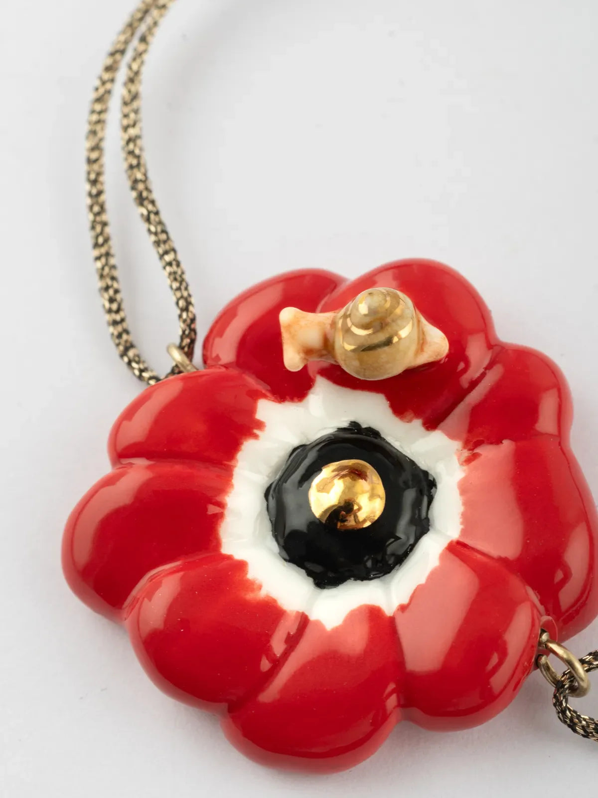 Braccialetto con cordino di anemone rosso iridescente