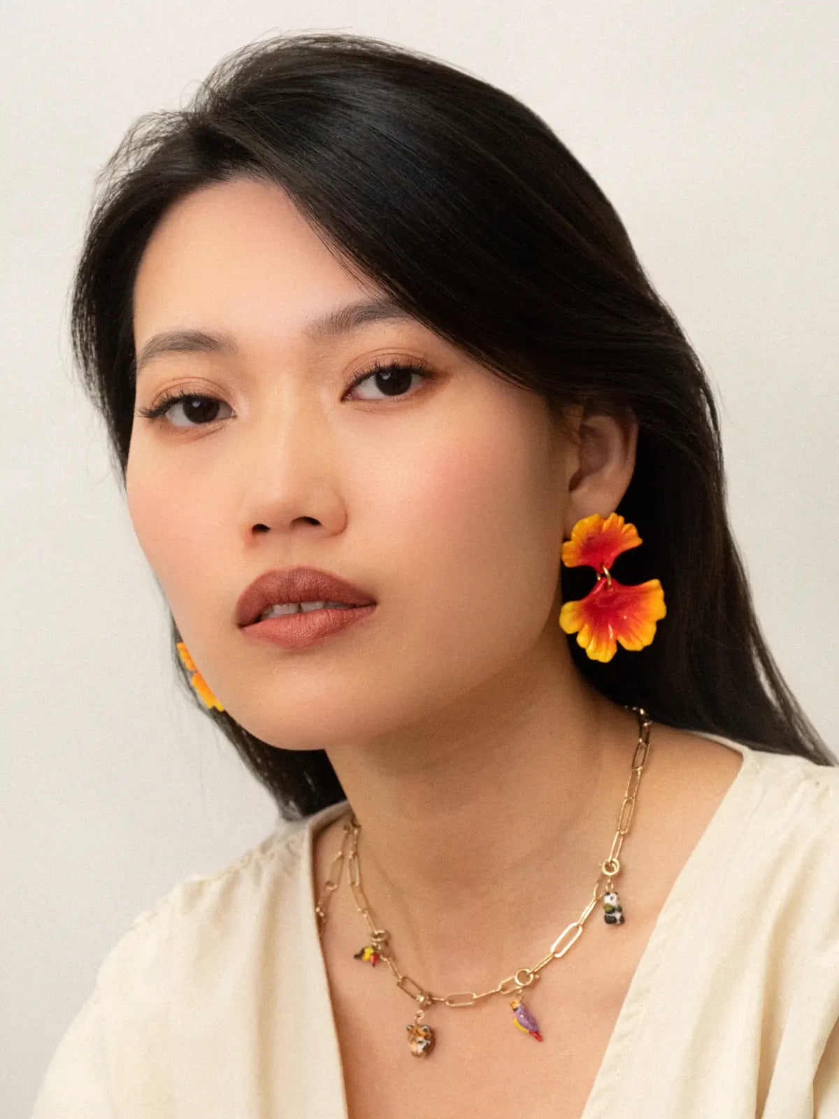 Orange ginkgo leaf dangle earrings