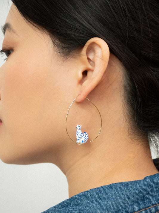 Large blue and white cat hoop earrings