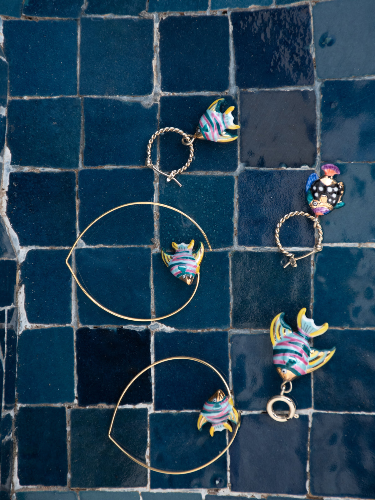 Mini rainbow fish hoop earring - Sold individually