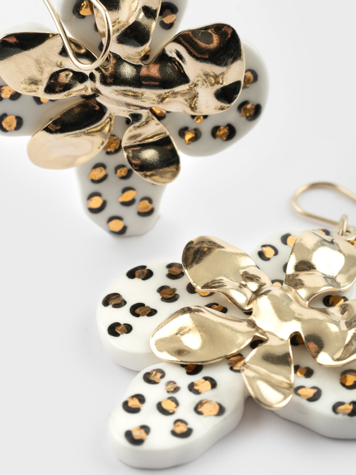 White and gold leopard petal drop earrings
