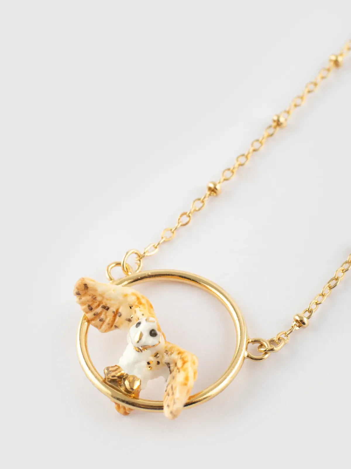 Owl necklace in flight