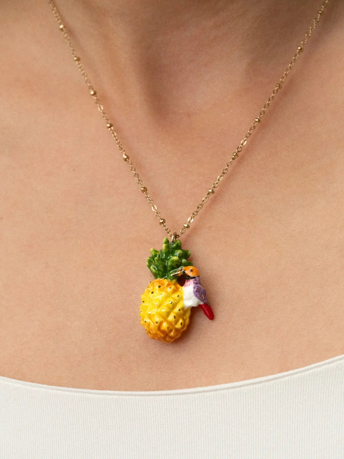 Gould pineapple and diamond bird necklace