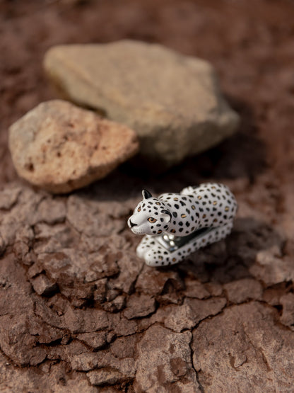 Agrafeuse léopard blanc et doré