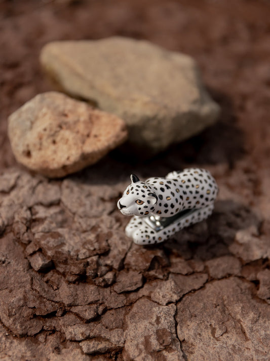 Agrafeuse léopard blanc et doré