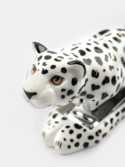 Agrafeuse léopard blanc et doré