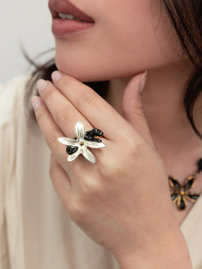 Erine flower and panther ring