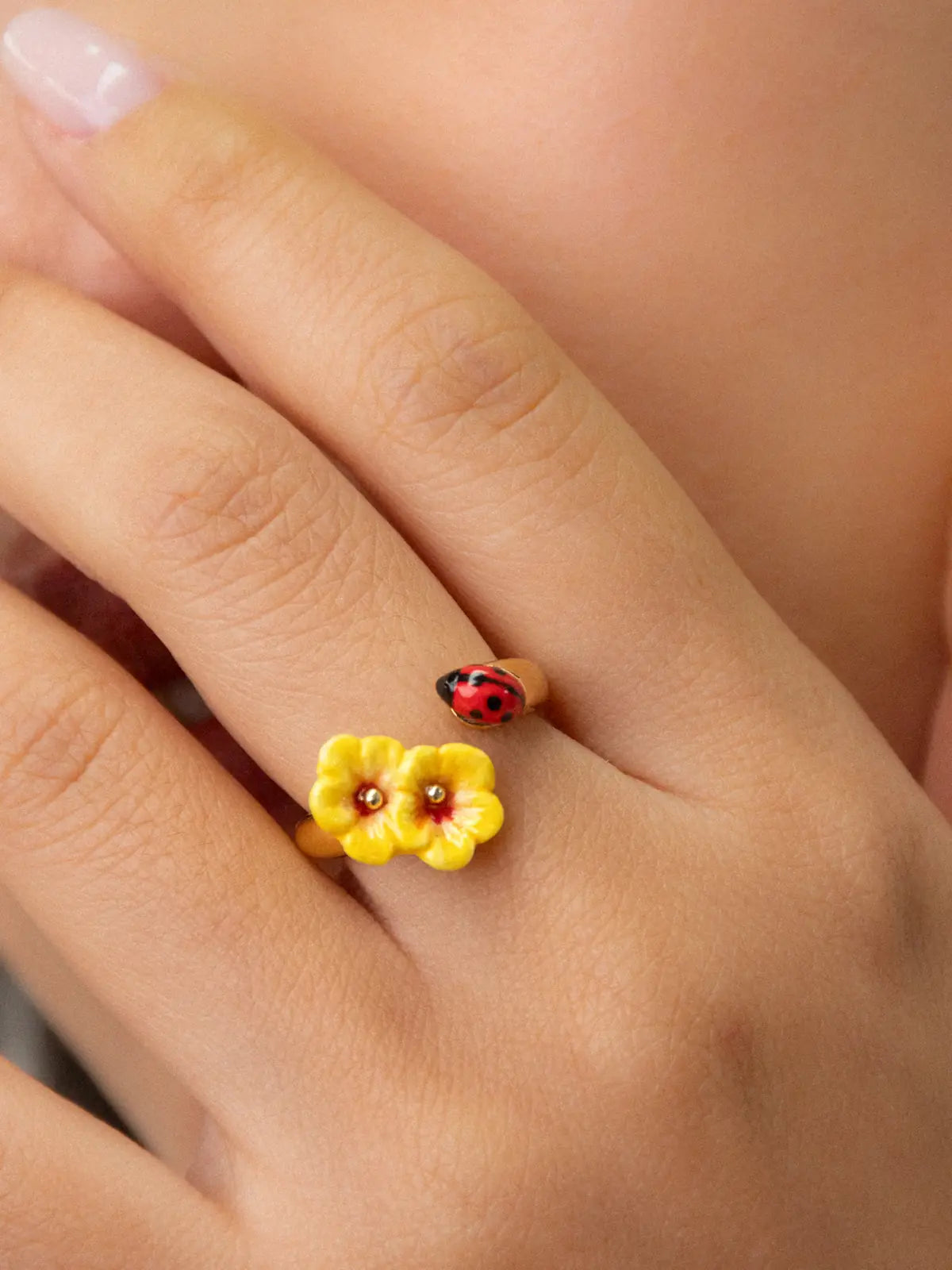 Bague FaceToFace hibiscus et coccinelle