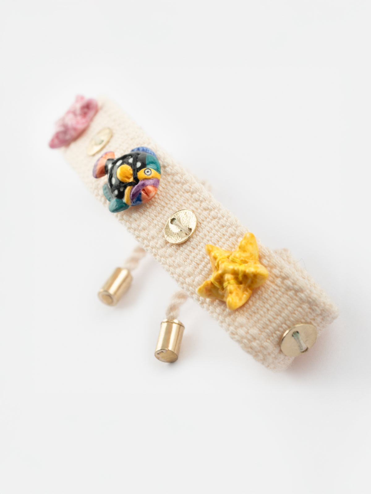 Beige braided charm bracelet