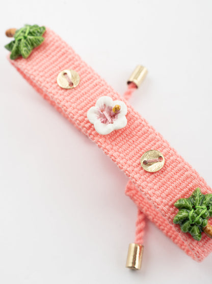 Pink braided charm bracelet