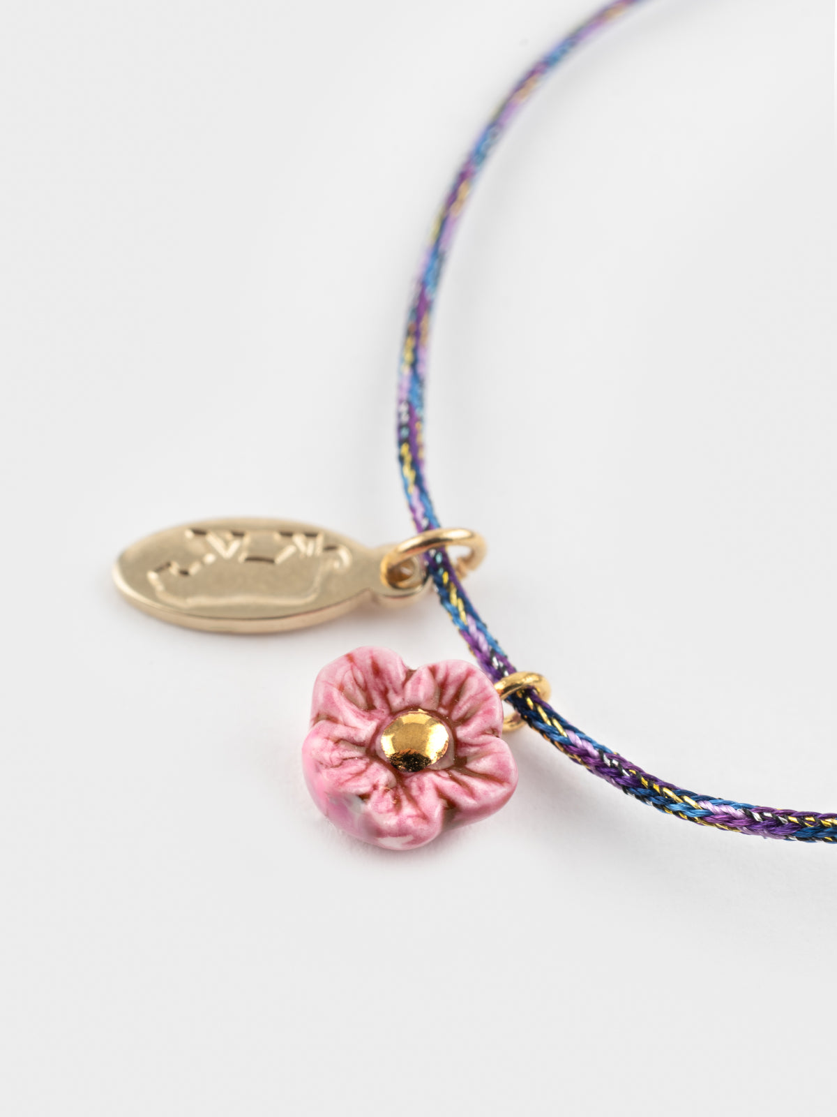 Braccialetto con cordino a fiori rosa