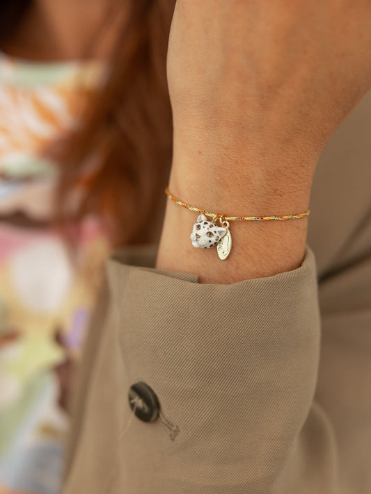 Bracelet cordon léopard blanc et doré