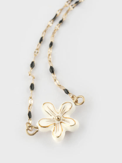 Bracelet perles et fleur blanches
