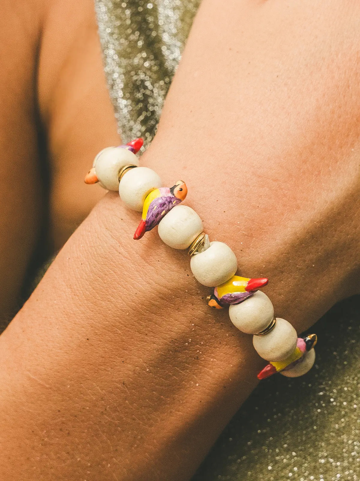 Bracelet oiseau diamant de Gould et perles