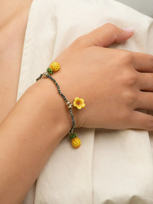 Bracelet perles d'hématite hibiscus et ananas