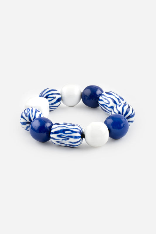 Bracciale maxi con perline zebrate blu e bianche