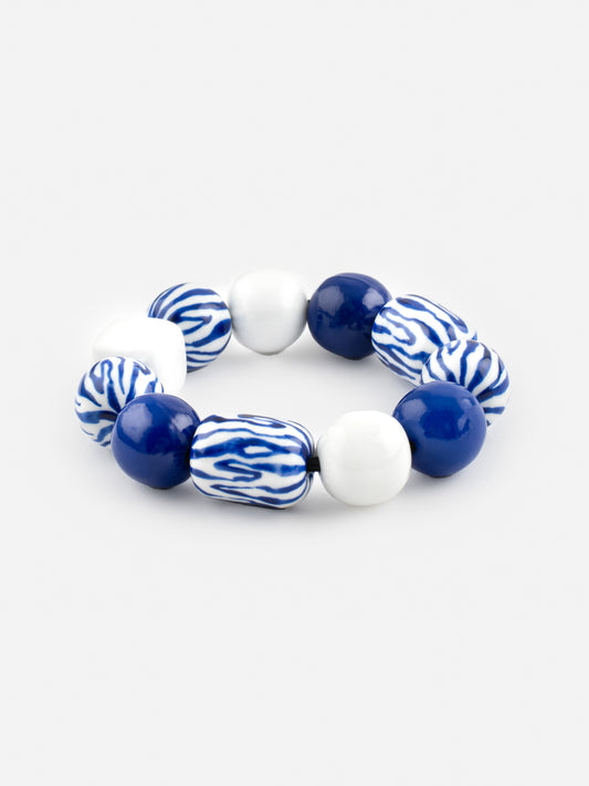 Bracciale maxi con perline zebrate blu e bianche