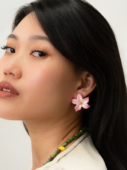 Pink fleur-de-lis ear studs