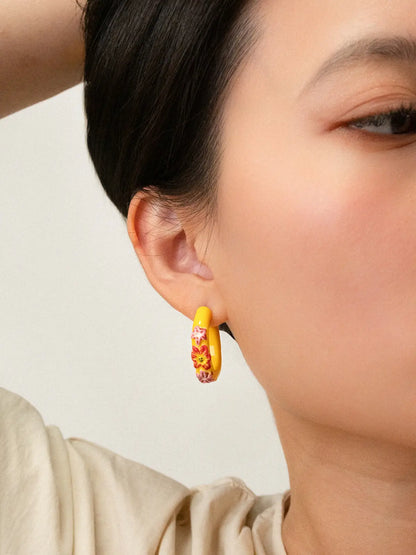 Yellow floral hoop earrings