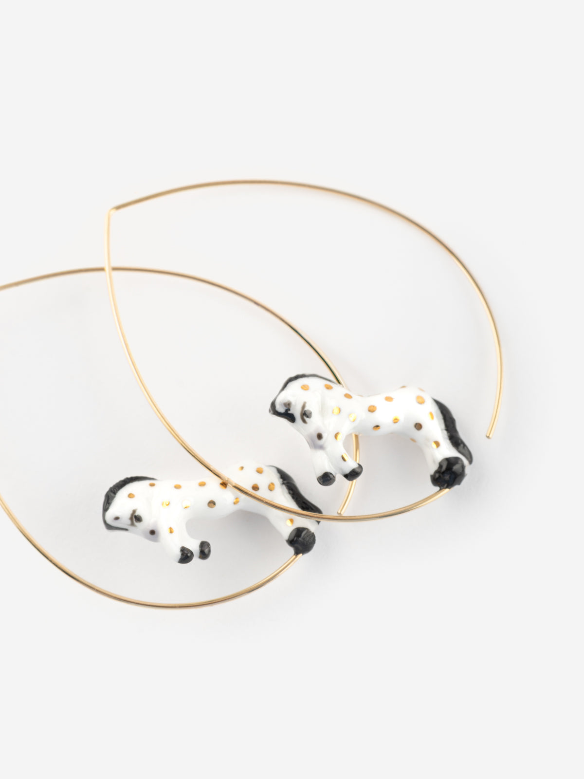 Large white horse hoop earrings
