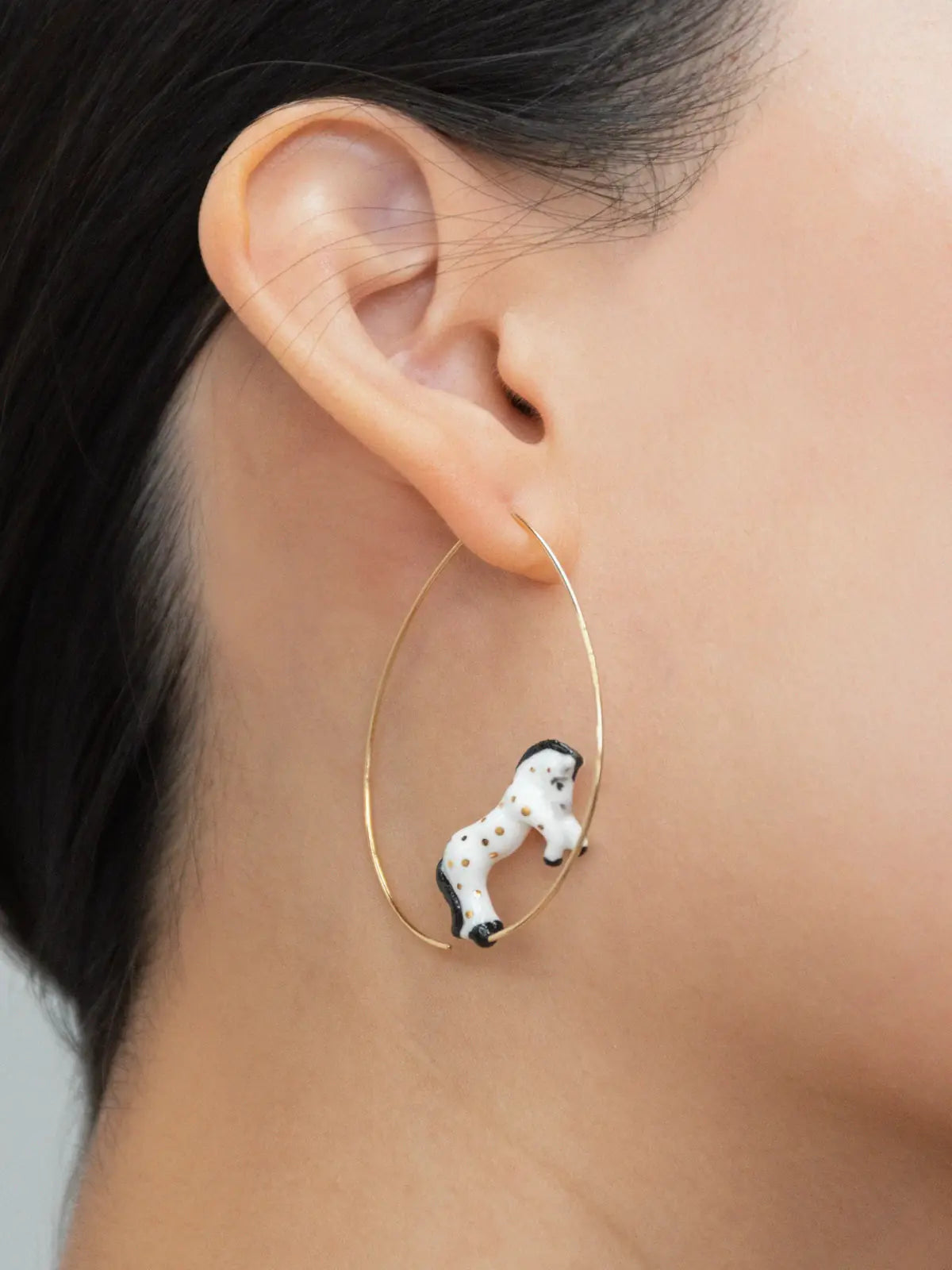 Large white horse hoop earrings
