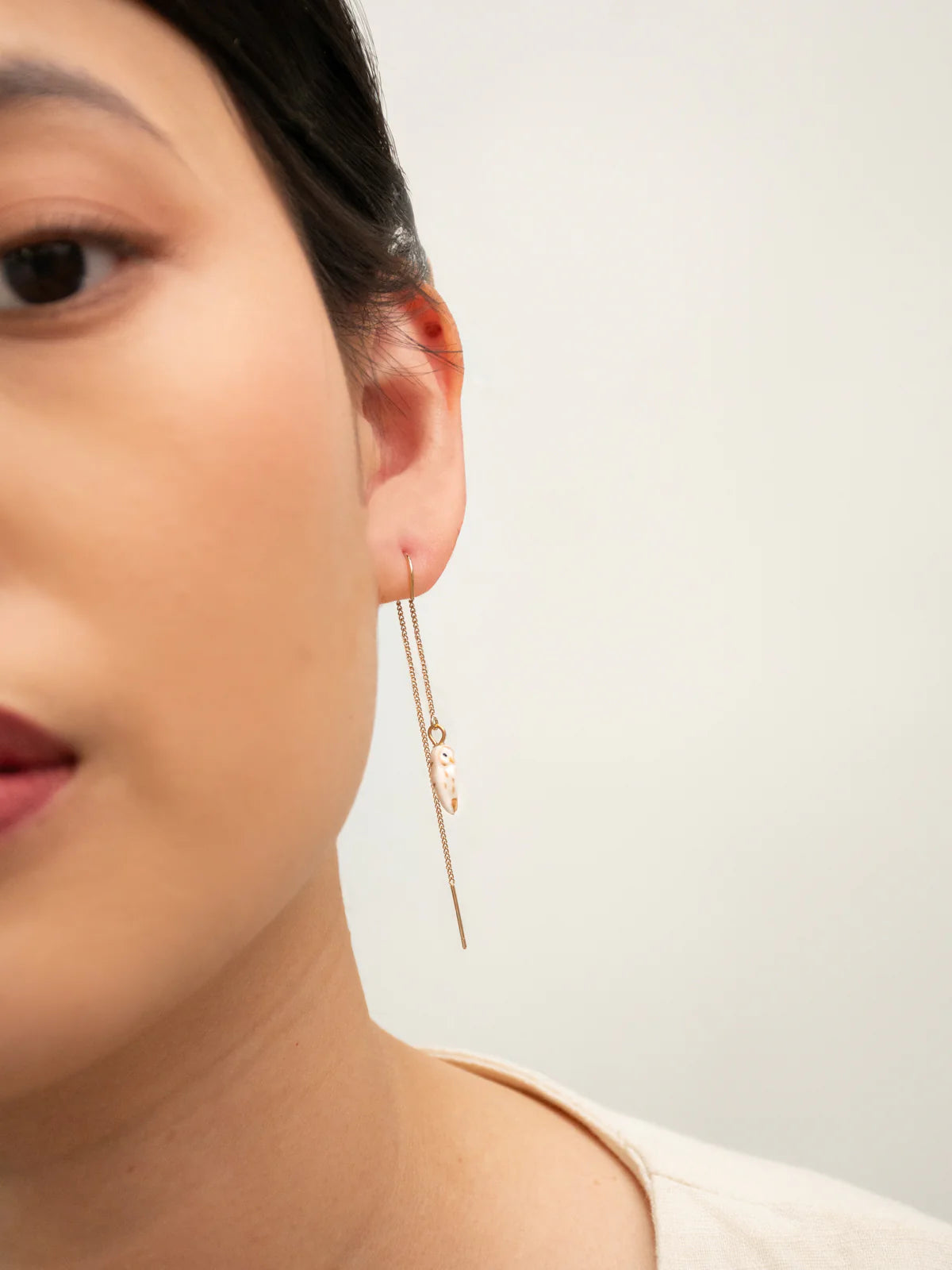 Longues boucles d'oreilles chouette blanche