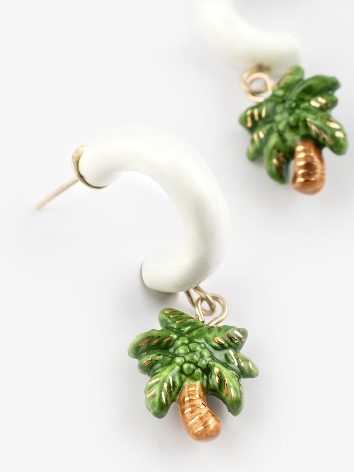 Orecchini con palma bianca
