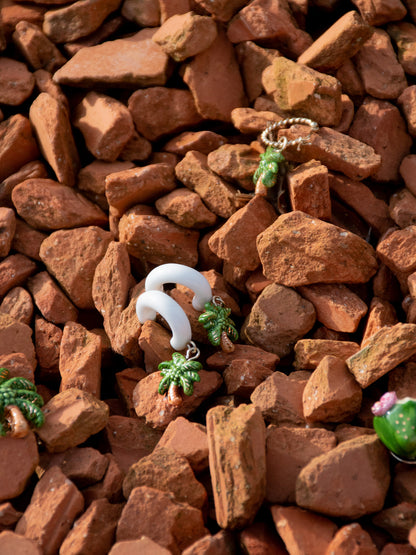 Orecchini con palma bianca