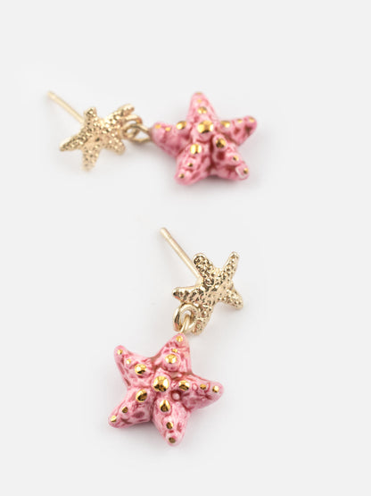 Orecchini pendenti a forma di stella marina rosa