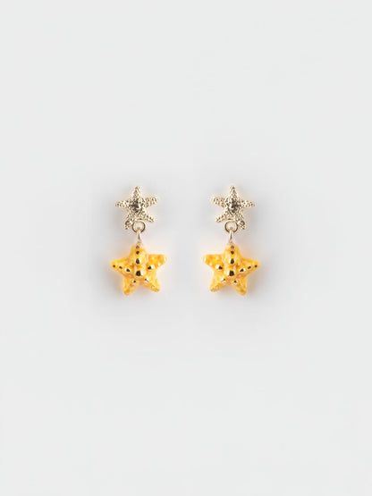 Orecchini pendenti a forma di stella marina gialla