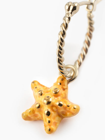 Mini orecchini a cerchio a forma di stella marina gialla - Venduti singolarmente