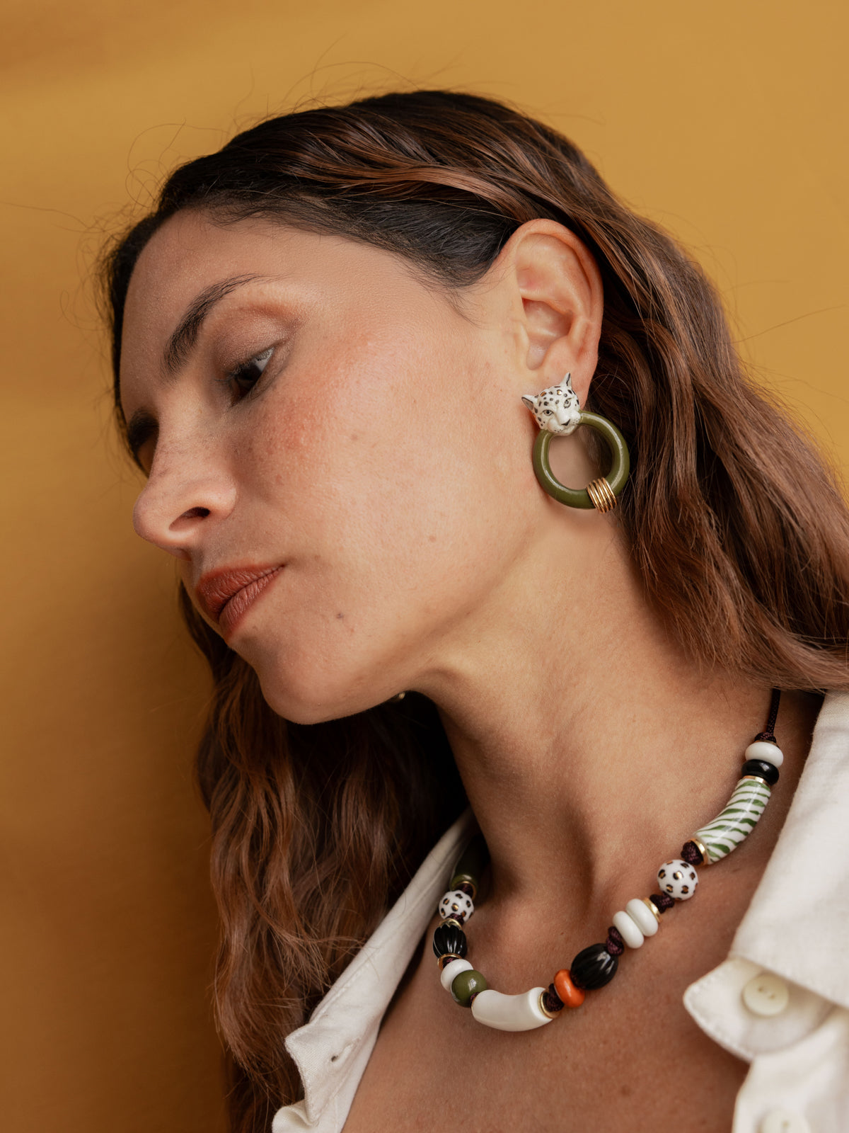 White and gold leopard print earrings