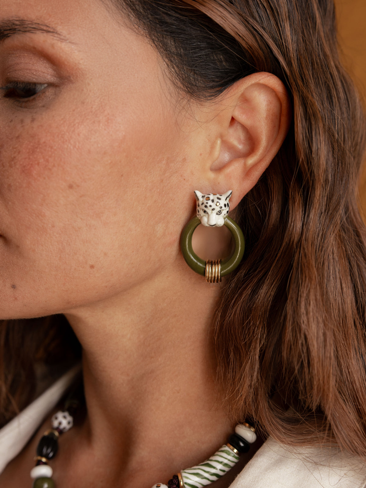 White and gold leopard print earrings