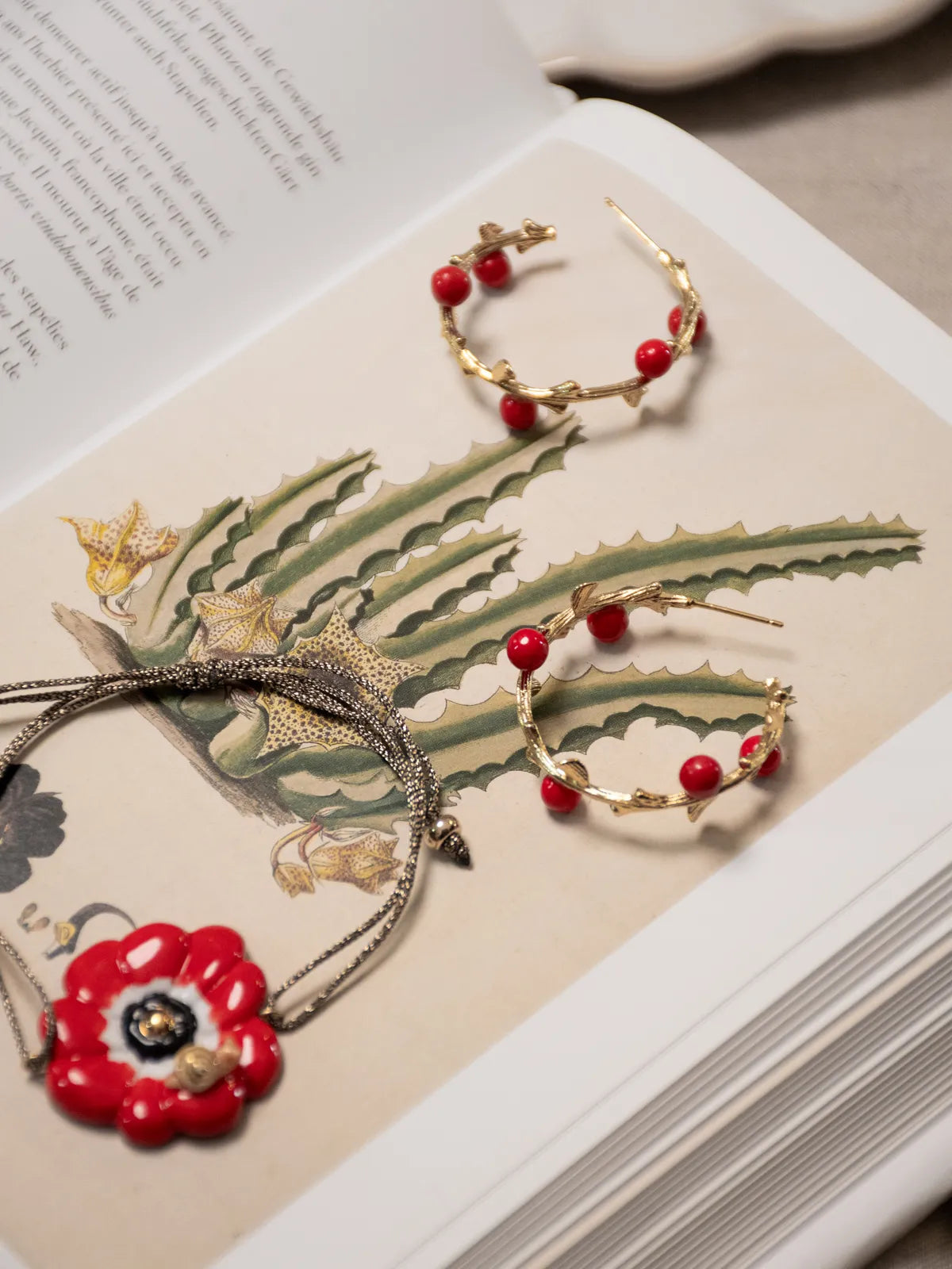 Boucles d'oreilles branches baies rouges