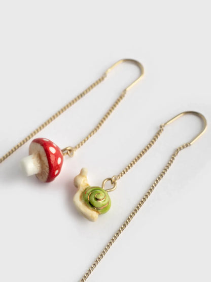 Longues boucles d'oreilles champignon et escargot