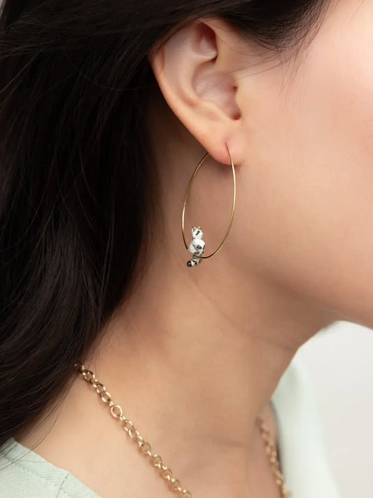 Grandi orecchini creoli a forma di procione