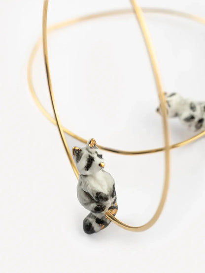 Grandi orecchini creoli a forma di procione