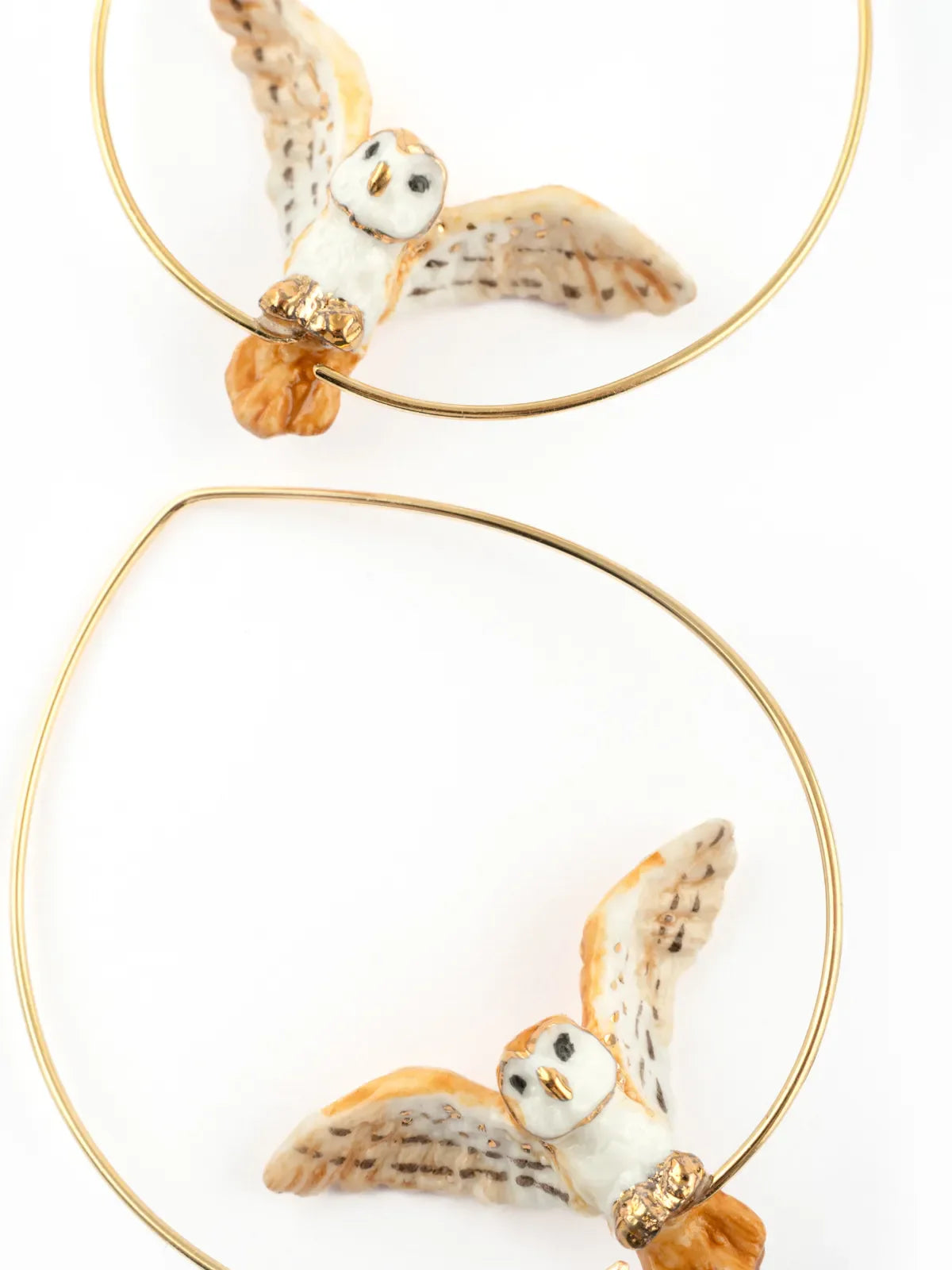 Grandes créoles chouette en vol