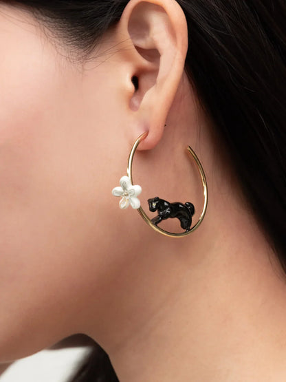 Round hoop earrings with panther and flower print