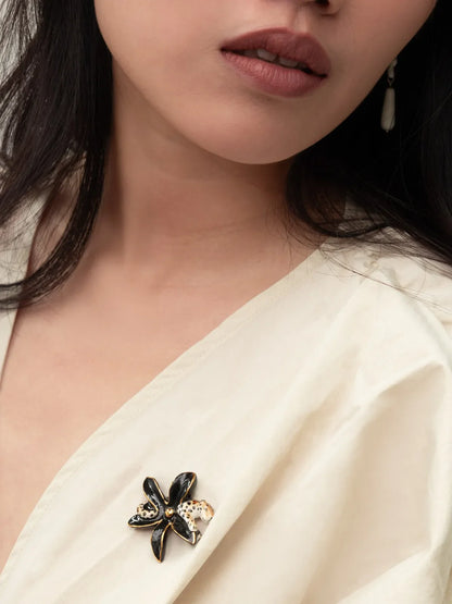 Pin's fleur d'Erine et léopard