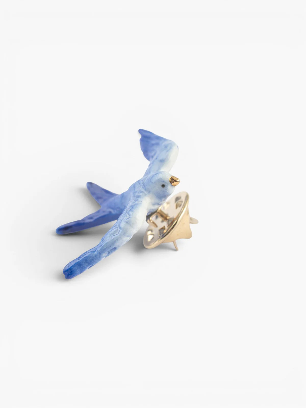 Pin’s hirondelle bleue