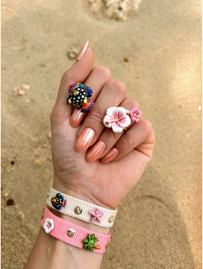 Beige braided charm bracelet