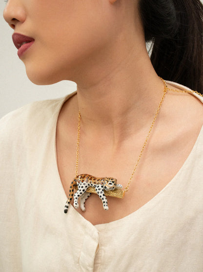 Leopard necklace on a branch
