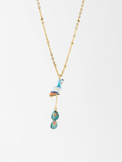 Peacock necklace on a branch