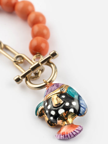 Collana di perle e pesci maculati