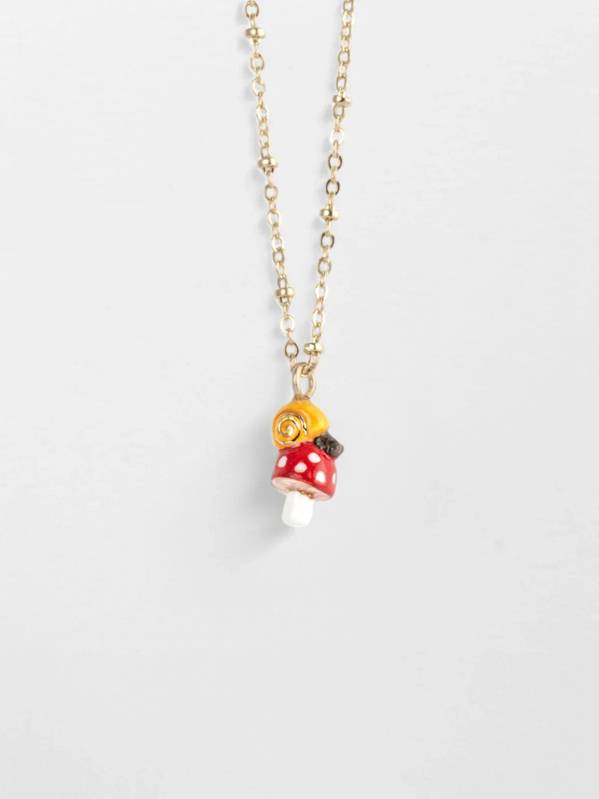Snail and mushroom necklace