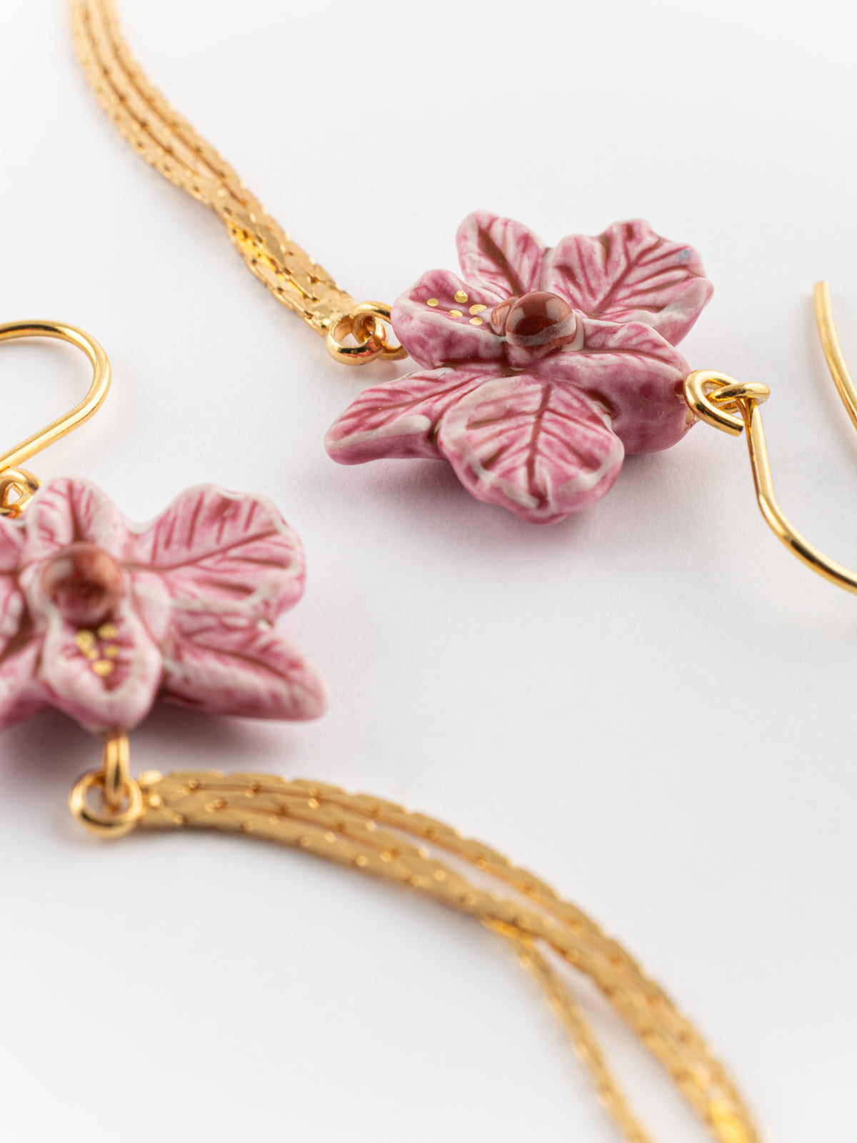 Boucles d'oreilles orchidée rose avec franges