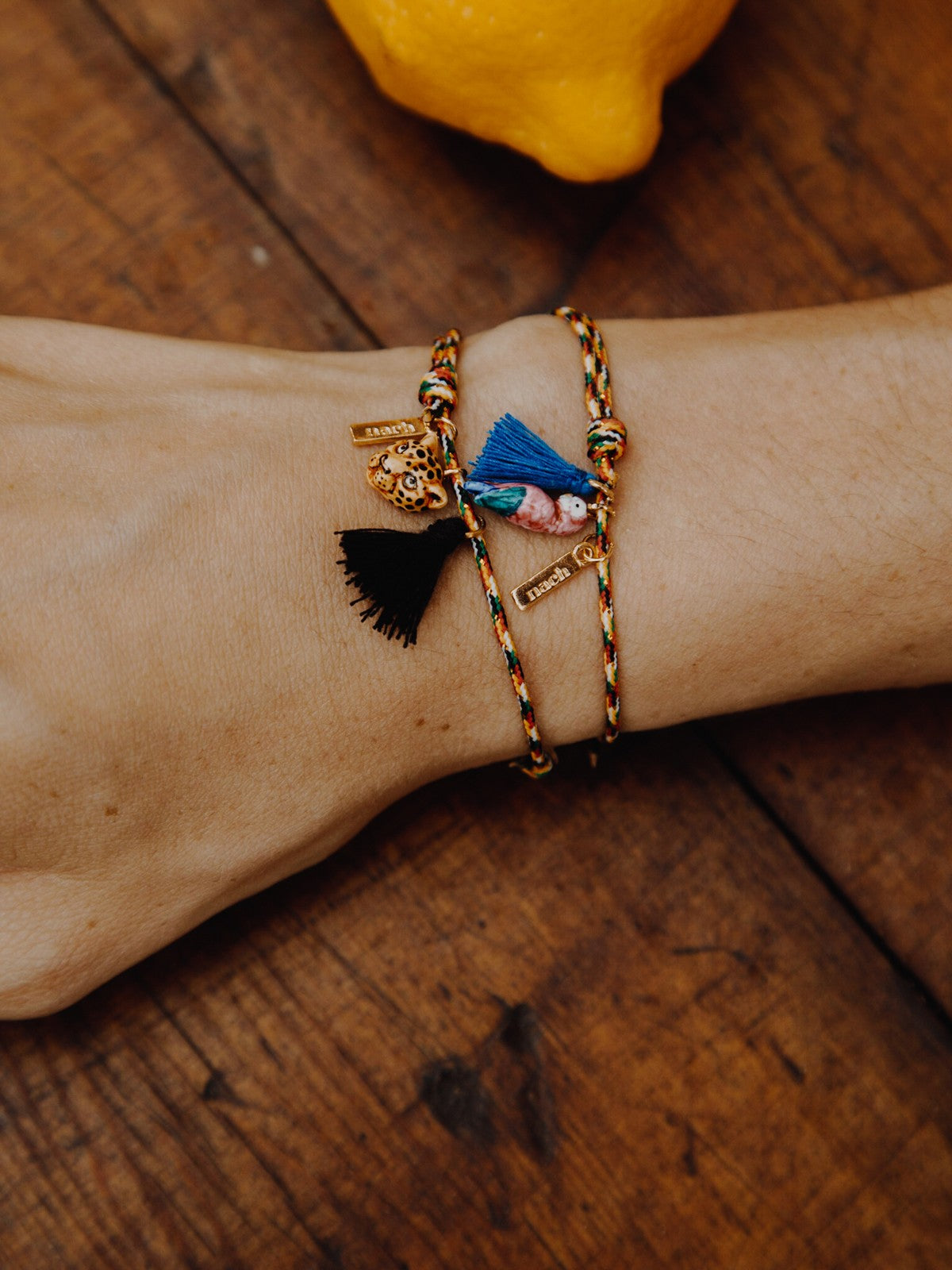 Bracelet corde oiseau pompon