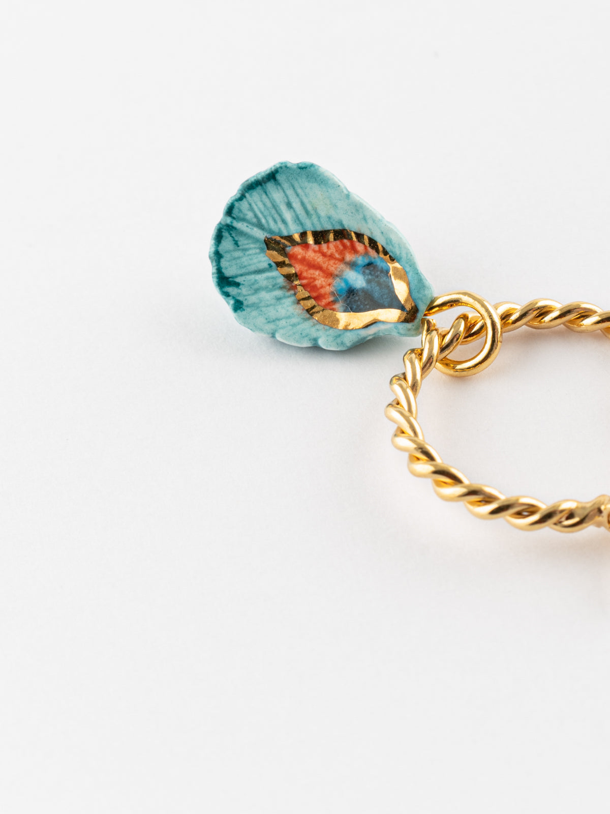 Mini créole plume de paon - Vendue à l'unité